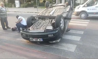 Takla atan araç içinde kalan sürücüyü çevredeki vatandaşlar kurtardı
