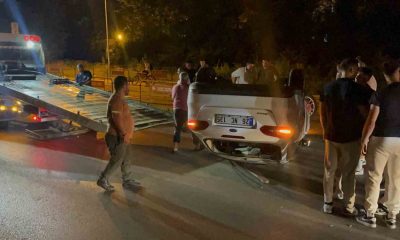 Emniyet kemeri takılı olan sürücü takla atan araçtan yara almadan kurtuldu (Video Haber)