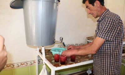 Kavurucu sıcakta Akdağ’daki kardan yapılan şerbetle serinliyorlar