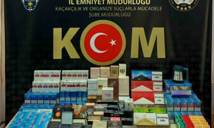 Yüzlerce paket kaçak sigara ve parfüm ele geçirildi