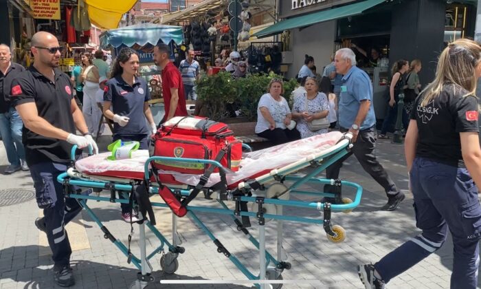 Bisikletten düşen şahıs sağlık ekipleri yanına gelince ayaklanıp gitti